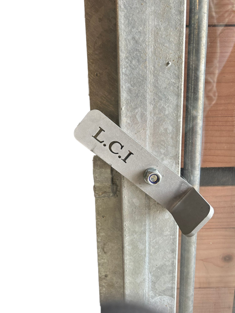 Close-Up of Steel Bars and Plexiglas on an External Stable Window