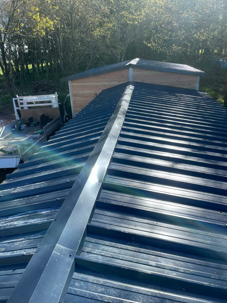 Installation of a Ridge Cap on a Steel Sheet Roof