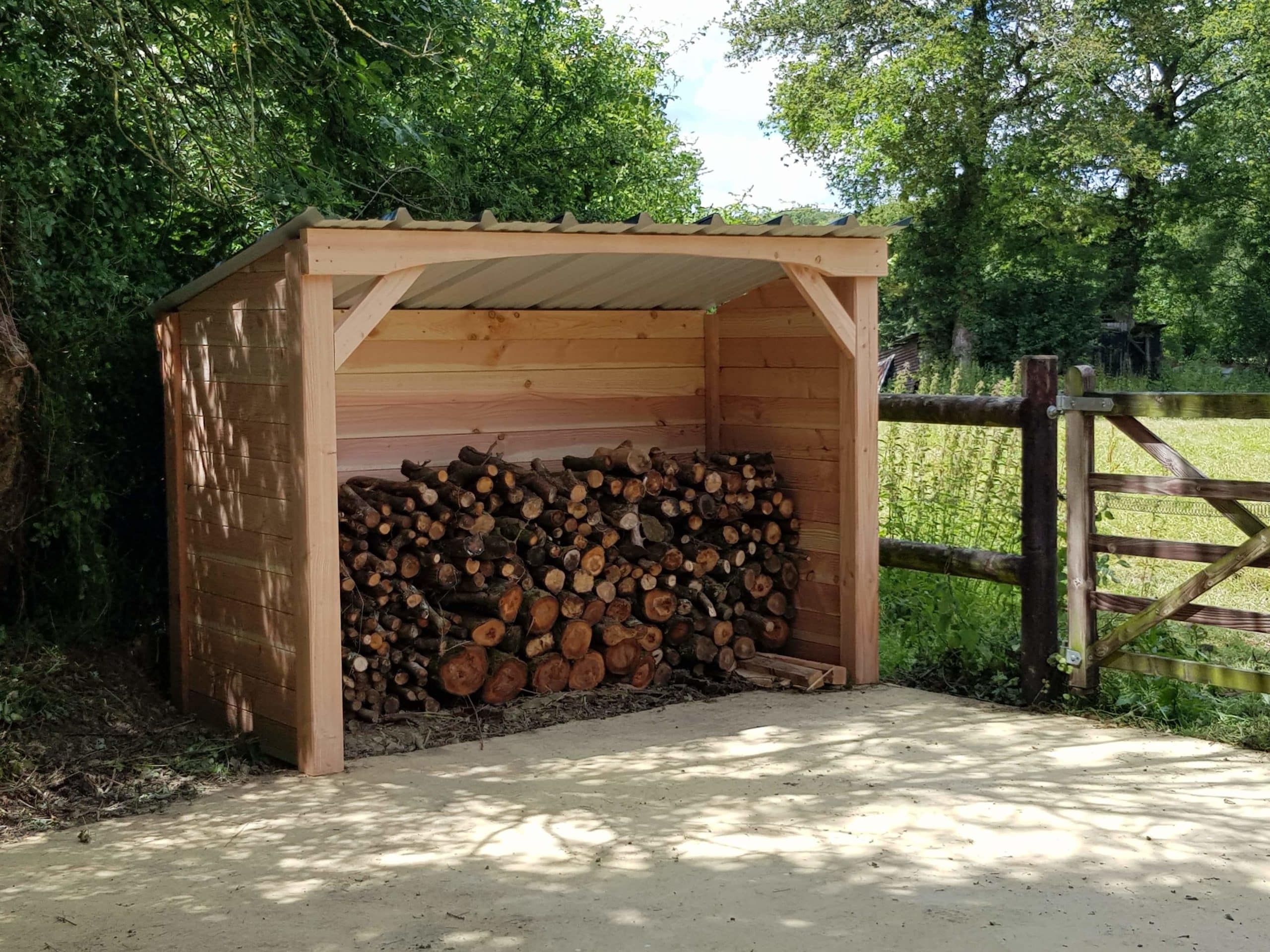 General view of the LCI Cheval Douglas fir log store for storing and protecting firewood.