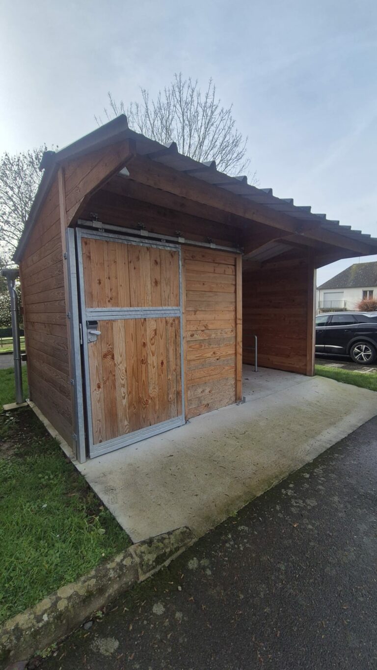 Douglas bike shelter made from French Douglas fir with steel roofing